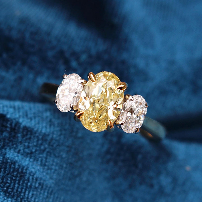 18ct Yellow and White Gold Yellow and White Oval Diamond Ring